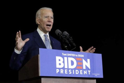 Joe Biden speaks behind a podium at one of his campaign events.