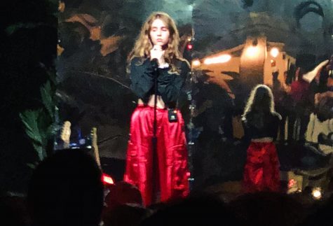 Photograph of Clairo on stage