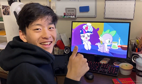 Edward Lu enjoys an episode of “My Little Pony: Friendship is Magic.”
