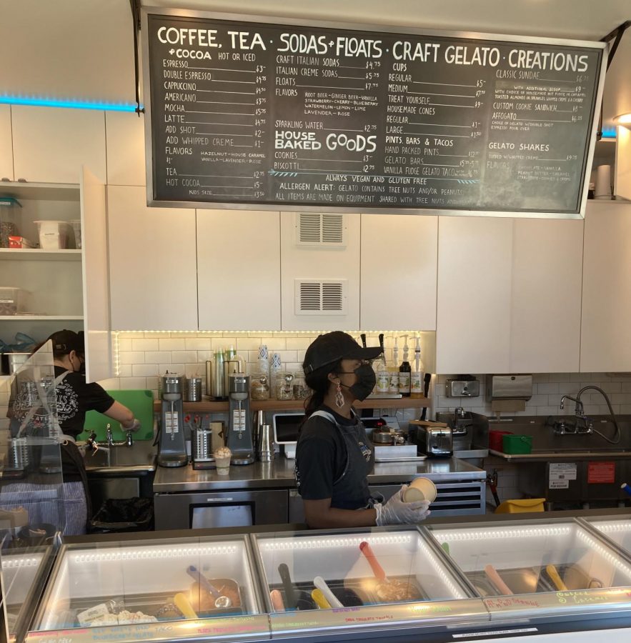 Workers Mars and Savanna take orders and scoop gelato for costumers at Conscious Creamery in Sacramento, Calif.