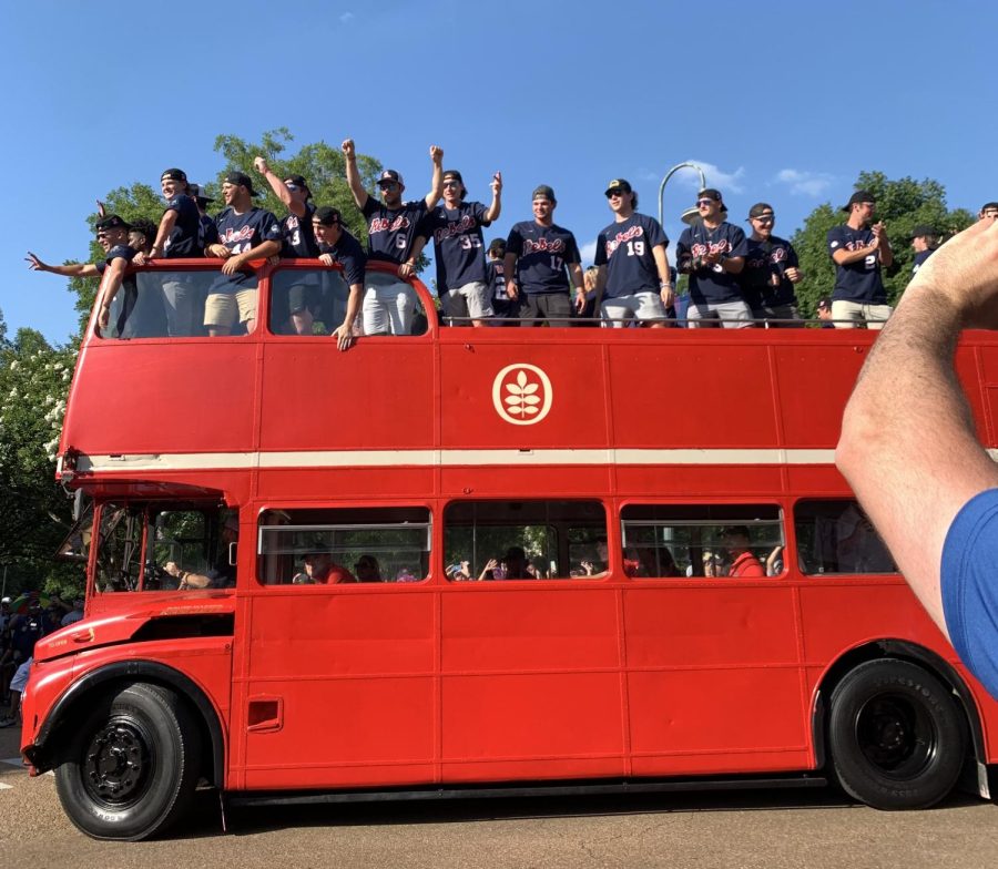 The Ole Miss baseball team parades through Oxford, Miss., on June 29, 2022, as part of the celebration marking its NCAA national championship. 