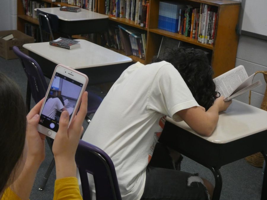 An invasion or privacy? Two Sequoyah Scribe models illustrate the problem with student-created Instagram accounts. Students are photographed without their permission, for example, when they are asleep, and photos are published online.
