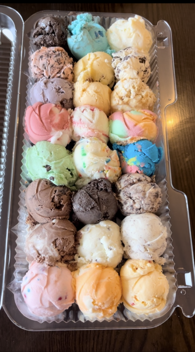 012 Twenty four scoops of ice cream — flavors ranging from Firecracker to Black Cherry and Dirt Cake — make up Hansen’s ice cream flight, costing only $15 at the local Wisconsin shop. (June 8, 2024)