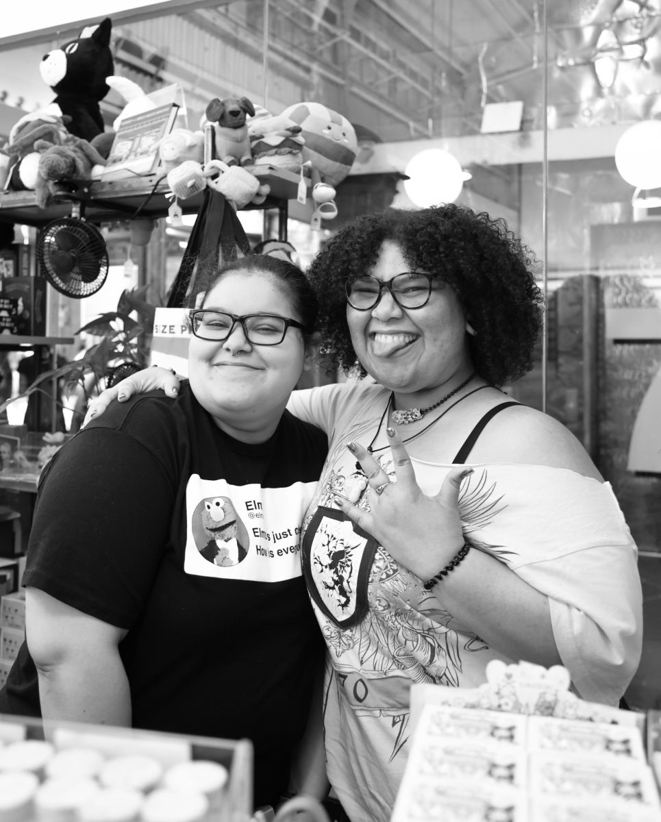 Best friends and bookstore workers pose for the camera during the summer of 2024 in the Chelsea neighborhood of New York City.