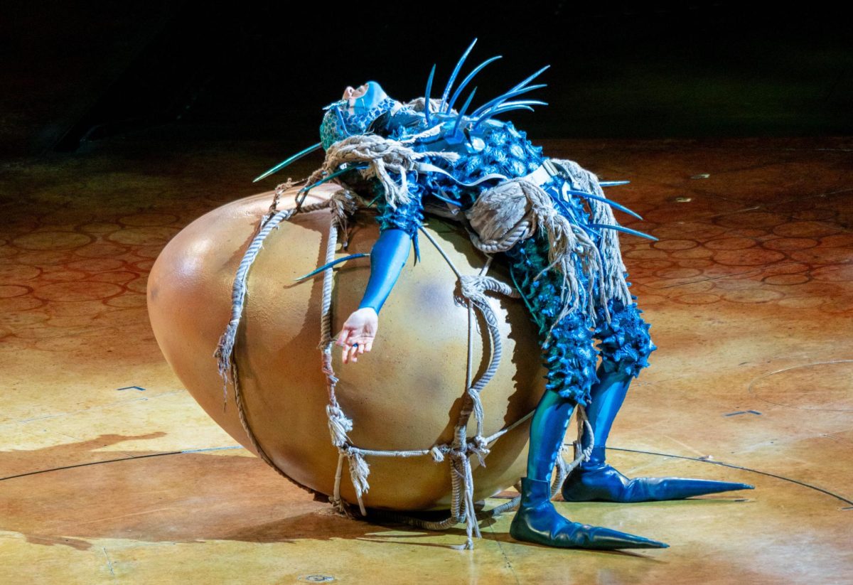 The Foreigner collapsed with exhaustion after bringing the ovo to the insect world during Cirque Du Soleil’s OVO, performed July 19, 2024, at Agganis Arena in Boston. 
