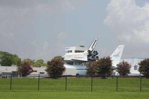 The centerpiece of Independence Plaza is the full-scale Space Shuttle replica, dubbed Space Shuttle Independence, that rests on top of NASA-905 on June 29, 2024. The plane that it rests on is one of the two Shuttle Carrier Aircrafts that NASA flew. It is a modified Boeing 747 that was used to bring the shuttles across the country if they landed in California. Opening in 2016, the exhibit is a relatively new addition to Space Center Houston.