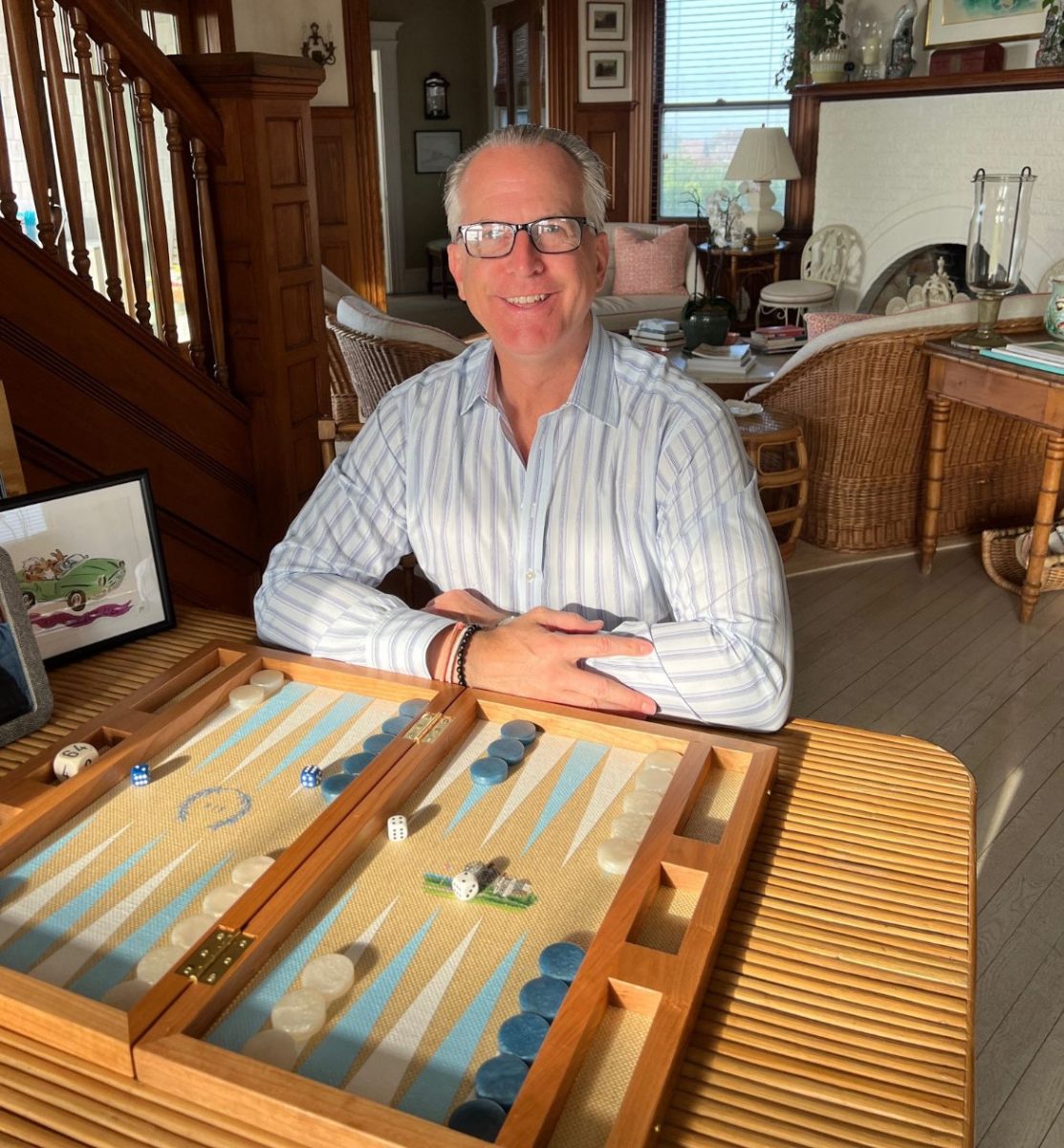 Charles Manger, here playing a practice game of backgammon in his mother's home, runs the Billiards and Backgammon Committee at the Racquet and Tennis Club in New York City. (Photo courtesy: Charles Manger)