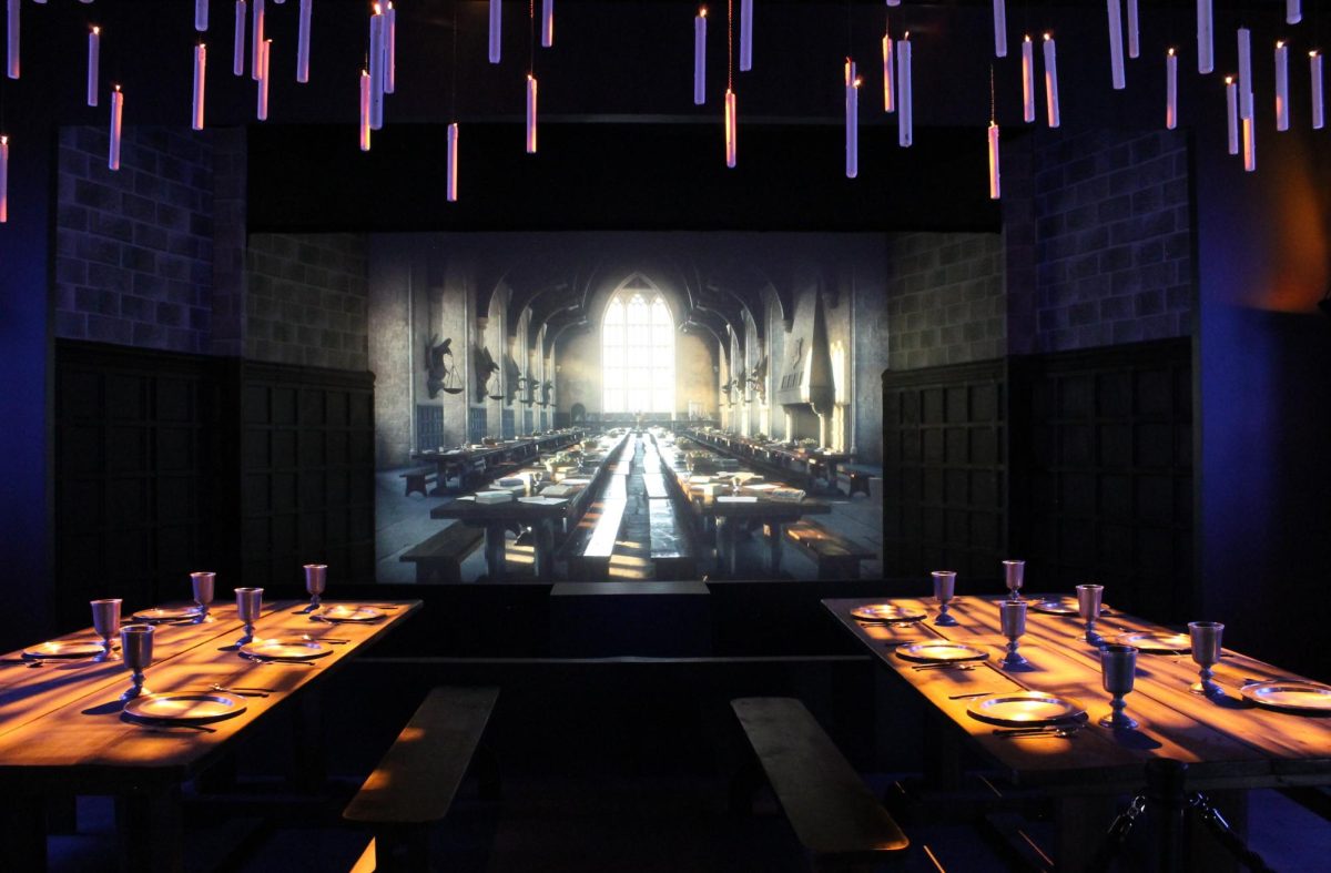 Visitors to Harry Potter: The Exhibition can stop by the Hogwarts dining hall, one of dozens of set pieces from the movie franchise brought to life at CambridgeSide through April 27, 2025. (Julia Feeley/Oakmont Regional)