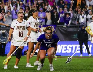 Northwestern senior Sam Smith (center) is jubilant after scoring the go-ahead goal late in the fourth quarter of a 12-11 upset win over Boston College in the NCAA Division 1 women's lacrosse semifinals on May 23, 2025, at Gillette Stadium.

