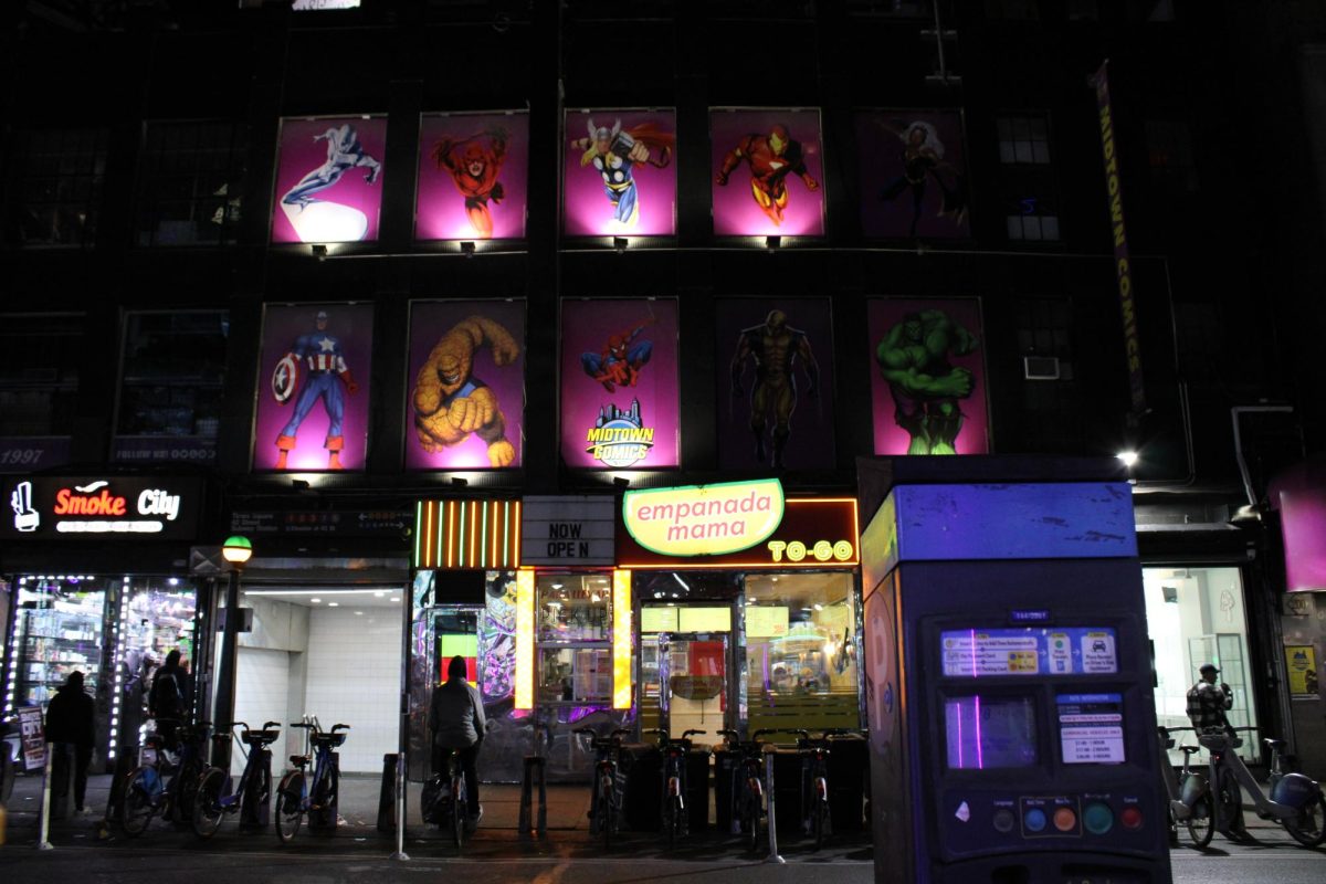 As the skylight dims, the neon lights of New York City alight in its place. One such contributor is a closed comics shop pedestrians continue by.