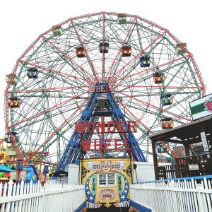 The thrills happen when riding the Wonder Wheel, which was built in 1920 and is a core part of the Coney Island amusement park. 