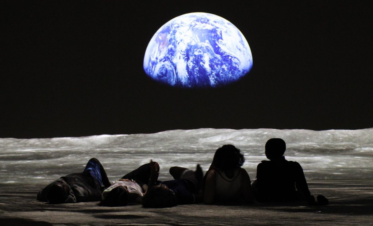 Students get comfortable before a showing of “The Moonwalkers: A Journey with Tom Hanks” at Boston's Saunders Castle on July 18, 2025.