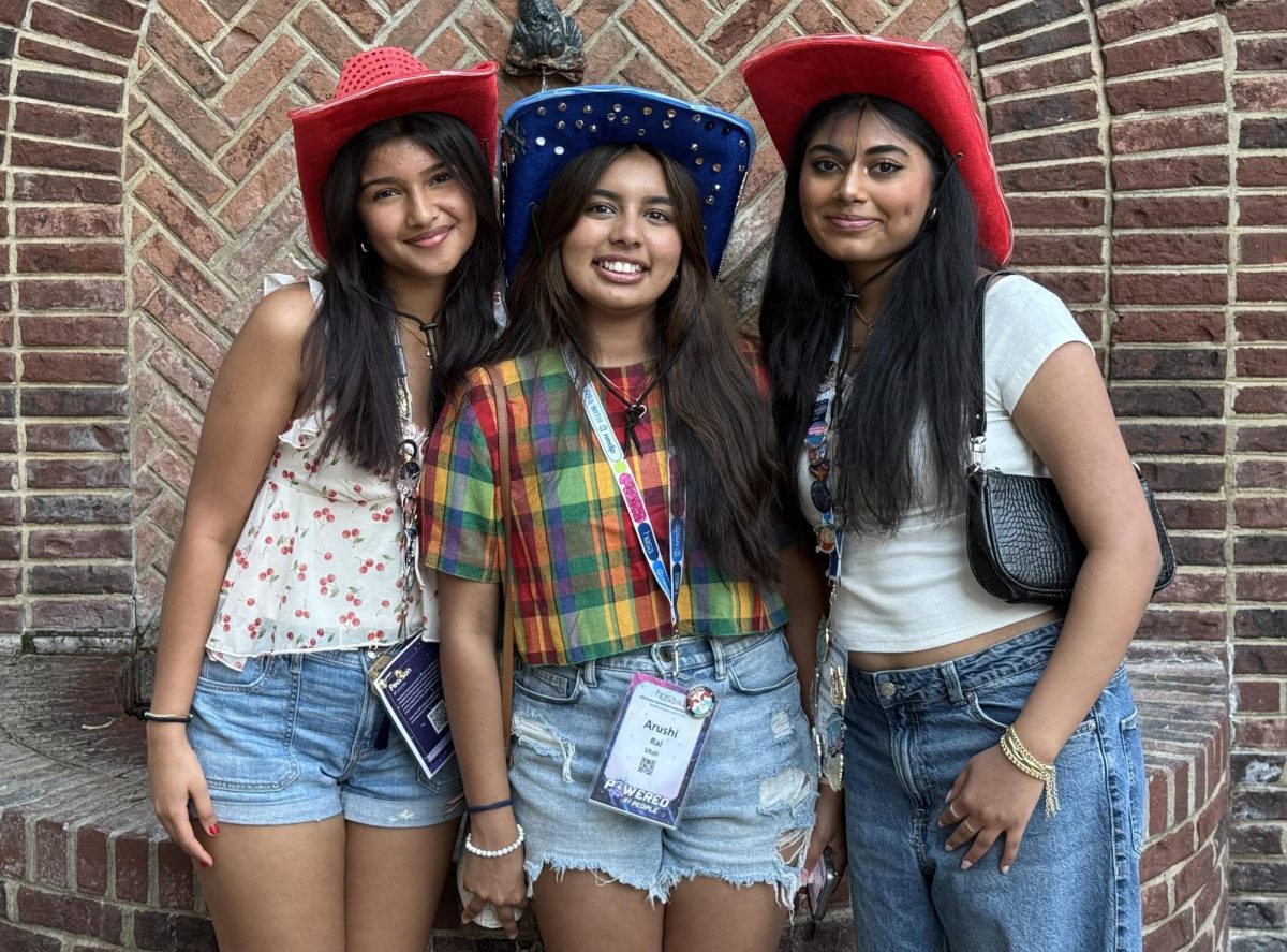Ridhitha Nachaegari, Arushi Rai, and Nithila Radhakrishnan, rising high school seniors at Skyline High School in Salt Lake City, are a part of their school’s HOSA programs. They wore cowboy hats (their state spirit item) during the third day of the 2025 conference in Nashville. 